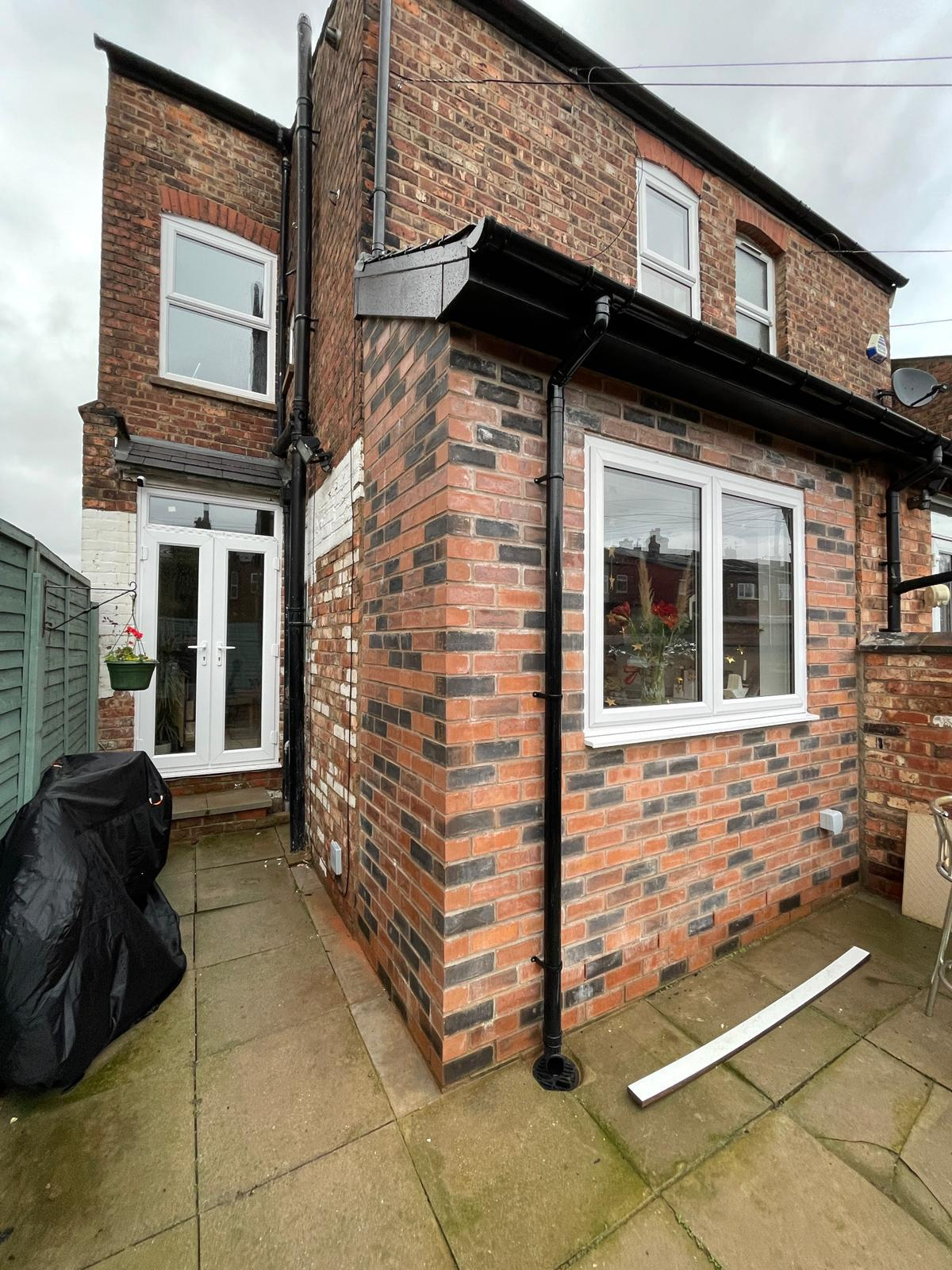 Monton kitchen extension, rear brickwork and new window from the garden
